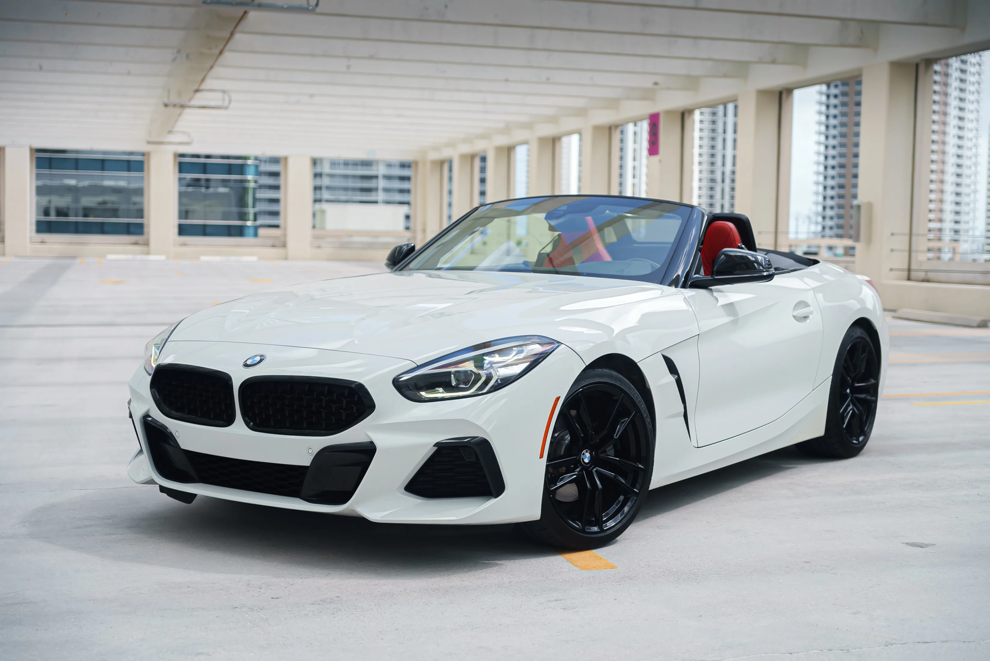 BMW Z4 white convertible — affordable sports car rental in Miami