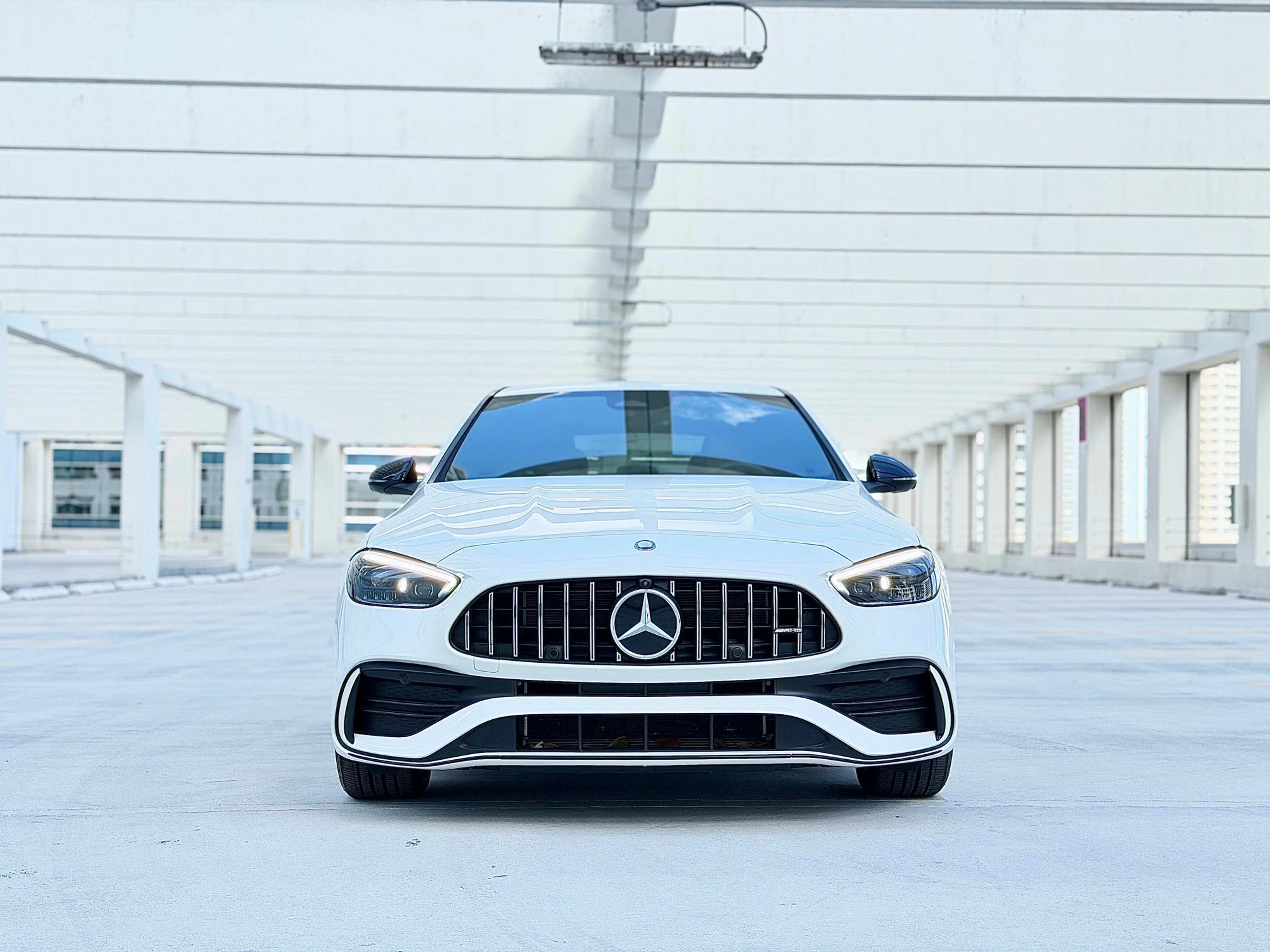 Mercedes-Benz C43 AMG White — exterior side view